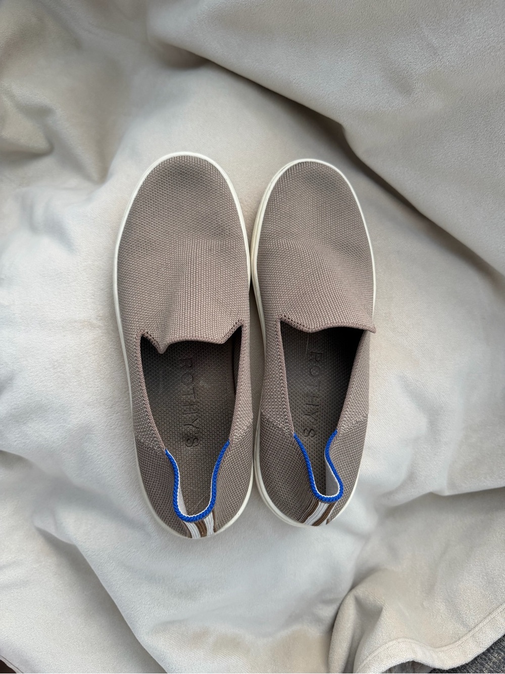 Rothy's Slip-On Knit Sneakers in Taupe with Blue Trim